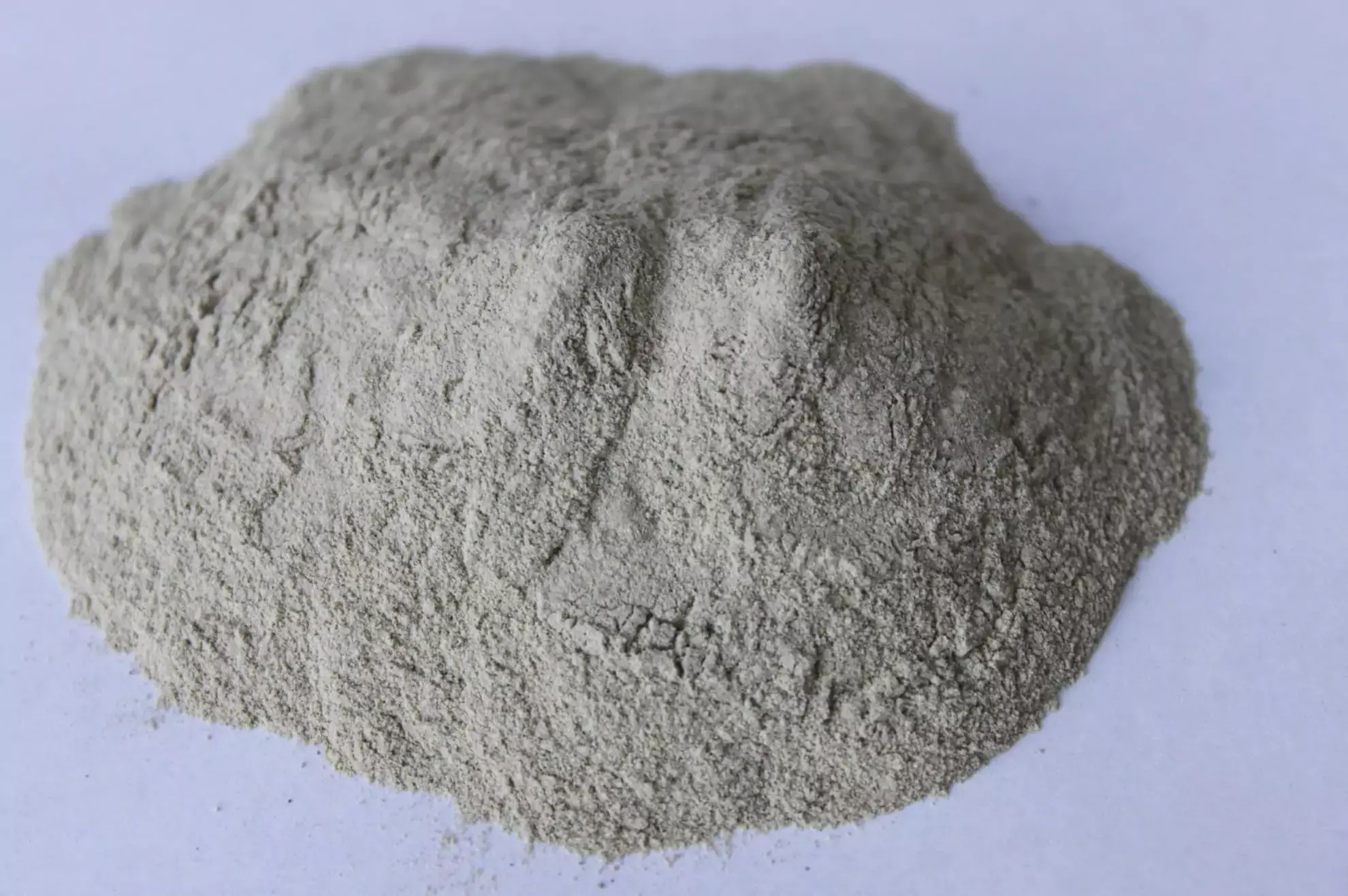 Volcanic can be found in many forms, one being bentonite clay powder.