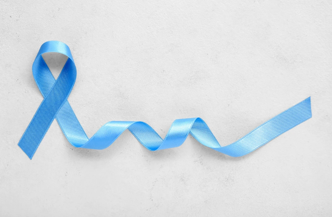 Diabetes awareness month is symbolized by a blue ribbon.